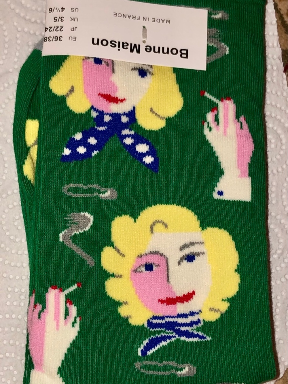 Bonne Maison green crew socks. Blonde girl smoking. Made in France. Chic cool